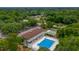 Aerial view of community pool and recreation building at 8608 Stonehedge Way, Hudson, FL 34667