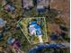 High-angle view of house and property lines at 92 Randolph Ave, Spring Hill, FL 34606