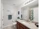 Small bathroom with shower/tub combo and granite vanity at 92 Randolph Ave, Spring Hill, FL 34606