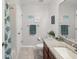 Small bathroom with shower/tub combo and granite vanity at 92 Randolph Ave, Spring Hill, FL 34606