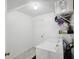 Laundry room with washer, dryer, and shelving at 92 Randolph Ave, Spring Hill, FL 34606