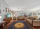 Spacious living room featuring hardwood floors, neutral walls, and ample natural light at 92 Randolph Ave, Spring Hill, FL 34606