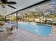 Inviting screened-in pool and patio area at 92 Randolph Ave, Spring Hill, FL 34606