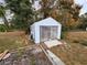 Detached white garage building at 11187 Blythville Rd, Spring Hill, FL 34608