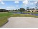 Aerial view of golf course and sand trap near houses at 11644 Spindrift Loop, Hudson, FL 34667