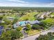 Aerial view of community clubhouse and pool at 11644 Spindrift Loop, Hudson, FL 34667