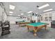 Game room featuring two billiard tables at 11644 Spindrift Loop, Hudson, FL 34667