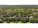 A picturesque community with golf course views, and lush landscaping, provides a serene and inviting environment at 121 Lindsay Ln # 31, Oldsmar, FL 34677