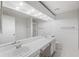 Bathroom featuring double sinks, mirror, and vanity at 121 Lindsay Ln # 31, Oldsmar, FL 34677