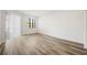 Bright bedroom featuring a large window and ample sunlight at 121 Lindsay Ln # 31, Oldsmar, FL 34677