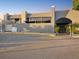 Exterior of Ardea Country Club clubhouse with a welcoming entrance, modern architecture, and signage at 121 Lindsay Ln # 31, Oldsmar, FL 34677