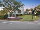 Ardea Country Club exterior, featuring modern architectural details and inviting entrance under a twilight sky at 121 Lindsay Ln # 31, Oldsmar, FL 34677