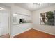 Open dining room features hardwood floors and ample natural light at 121 Lindsay Ln # 31, Oldsmar, FL 34677