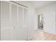 Bright entryway features tiled floors and a spacious closet for storage at 121 Lindsay Ln # 31, Oldsmar, FL 34677
