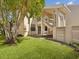 Charming condo with a well-kept lawn and inviting front entrance at 121 Lindsay Ln # 31, Oldsmar, FL 34677