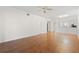 Bright living room featuring hardwood floors and a ceiling fan at 121 Lindsay Ln # 31, Oldsmar, FL 34677