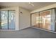 The screened patio has a view of the golf course with sliding glass doors at 121 Lindsay Ln # 31, Oldsmar, FL 34677