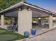 Enjoy the outdoors in a recreational area with a putting green, covered seating, and lush landscaping at 121 Lindsay Ln # 31, Oldsmar, FL 34677