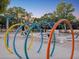 Fun-filled splash pad at the community pool area, perfect for cooling off on a hot day at 121 Lindsay Ln # 31, Oldsmar, FL 34677