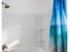 Clean bathroom with shower/tub combo and ocean-themed shower curtain at 1244 31St E Ave, Bradenton, FL 34208