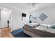 Bedroom with a double bed, a full-length mirror, and access to the bathroom at 1244 31St E Ave, Bradenton, FL 34208