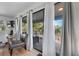 View from living room to deck with access through sliding doors at 1244 31St E Ave, Bradenton, FL 34208