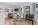 Small dining area with a glass table and four grey chairs at 1244 31St E Ave, Bradenton, FL 34208