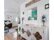 Entryway with console table and decorative items, view into living room at 1244 31St E Ave, Bradenton, FL 34208