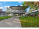 Elevated home with a spacious deck and large backyard at 1244 31St E Ave, Bradenton, FL 34208