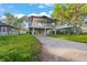 Elevated home with a spacious deck and large backyard at 1244 31St E Ave, Bradenton, FL 34208