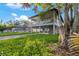 Elevated home with a spacious deck and large backyard at 1244 31St E Ave, Bradenton, FL 34208