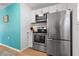 Stainless steel appliances and white cabinetry in kitchen at 1244 31St E Ave, Bradenton, FL 34208