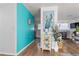 Bright living room with teal accent wall and stylish decor at 1244 31St E Ave, Bradenton, FL 34208