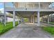 View under the house showing the parking area at 1244 31St E Ave, Bradenton, FL 34208