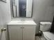Bathroom with vanity and toilet at 12804 Waterbury Ave, Hudson, FL 34669