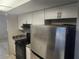 Modern kitchen with stainless steel appliances at 12804 Waterbury Ave, Hudson, FL 34669