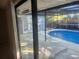 Inviting screened pool with ample deck space at 12804 Waterbury Ave, Hudson, FL 34669