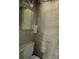 Simple bathroom with toilet and wall mounted sink at 4392 Craftsbury Dr, New Port Richey, FL 34652