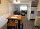 Small dining area with four-person table and seating at 4392 Craftsbury Dr, New Port Richey, FL 34652