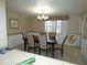 Formal dining room features a wood table and six chairs at 4392 Craftsbury Dr, New Port Richey, FL 34652