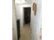 Hallway with access to bedroom and closet at 4392 Craftsbury Dr, New Port Richey, FL 34652
