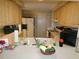 Bright kitchen features ample cabinetry and a full suite of appliances at 4392 Craftsbury Dr, New Port Richey, FL 34652