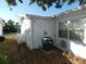 Side view of home showing AC unit and exterior wall at 4392 Craftsbury Dr, New Port Richey, FL 34652