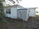 Small storage shed located in backyard at 4392 Craftsbury Dr, New Port Richey, FL 34652