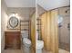 Updated bathroom with shower and a vanity at 4808 Vesper Ct, New Port Richey, FL 34655