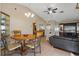 Dining area with round table and chairs, open to living room at 4808 Vesper Ct, New Port Richey, FL 34655