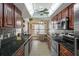 Modern kitchen with stainless steel appliances and granite countertops at 4808 Vesper Ct, New Port Richey, FL 34655