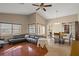 Open living and dining area with wood-look floors at 4808 Vesper Ct, New Port Richey, FL 34655