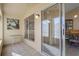 Bright sunroom with tiled floor, table, and sliding glass door at 4808 Vesper Ct, New Port Richey, FL 34655