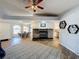 Living room features a fireplace and wood flooring at 5077 Kenmore, Spring Hill, FL 34608